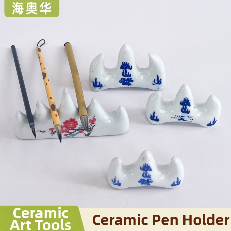 Keraminis šepetėlių laikiklis kalno formos, mėlynos ir baltos porcelianos stilius, piešimui ir meno pamokoms