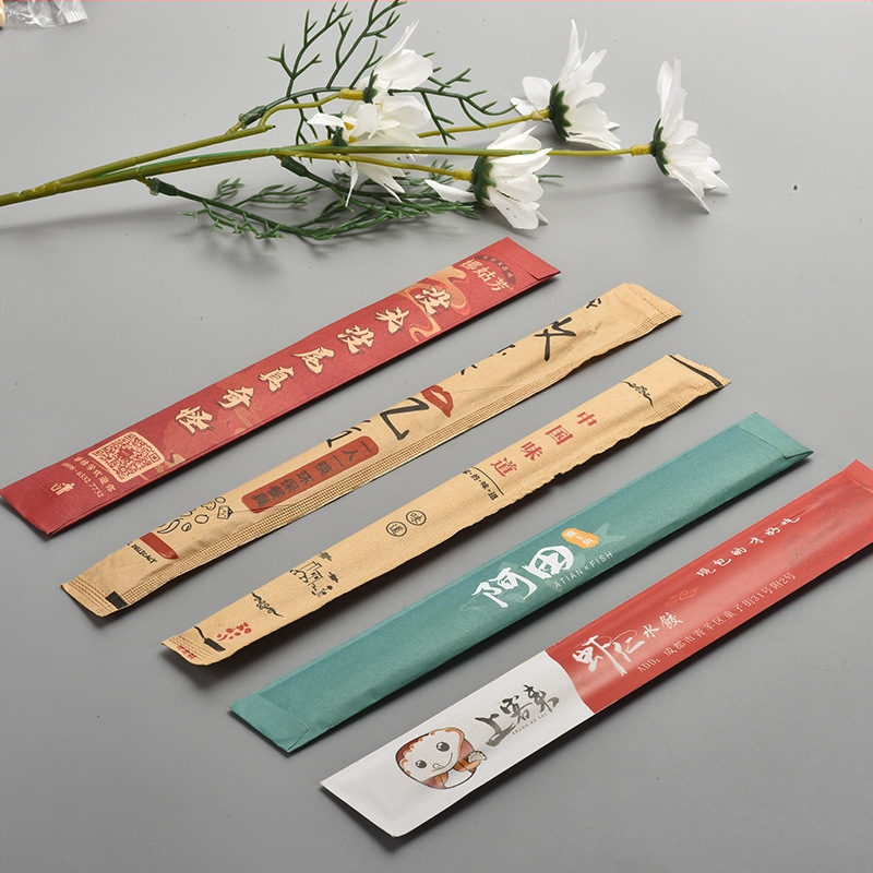 Dalyti lazdelės valgymo komplektas su pritaikytu logotipu, įtrauktas popierinis pakavimo maišelis, aukštos raiškos spausdinimas, 100 vienetų pakelis viešbučiams ir prabangiems restoranams