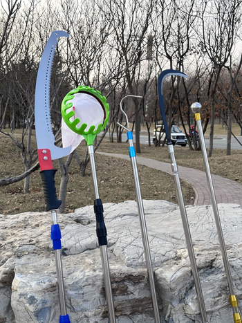 Nerūdijančio plieno teleskopinė tinklinė lazda, išsiplečianti, 2-6 dalys; skirta vaisių skynimui, apšvietimo stendui ir žvejybos tinklui.