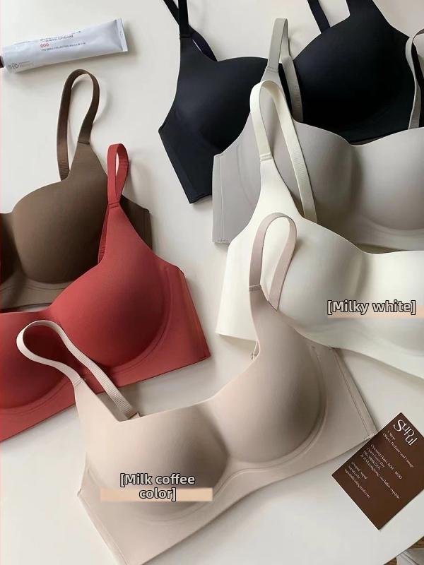 Kvadratinės kaklo liemenėlė, be siūlių, minkšta atrama, formuoti košyčiai su plonu viršumi ir storesniu apačia, pagrindinis audinys – nailonas, užpakalinė sagtis su keturiais kabliukais