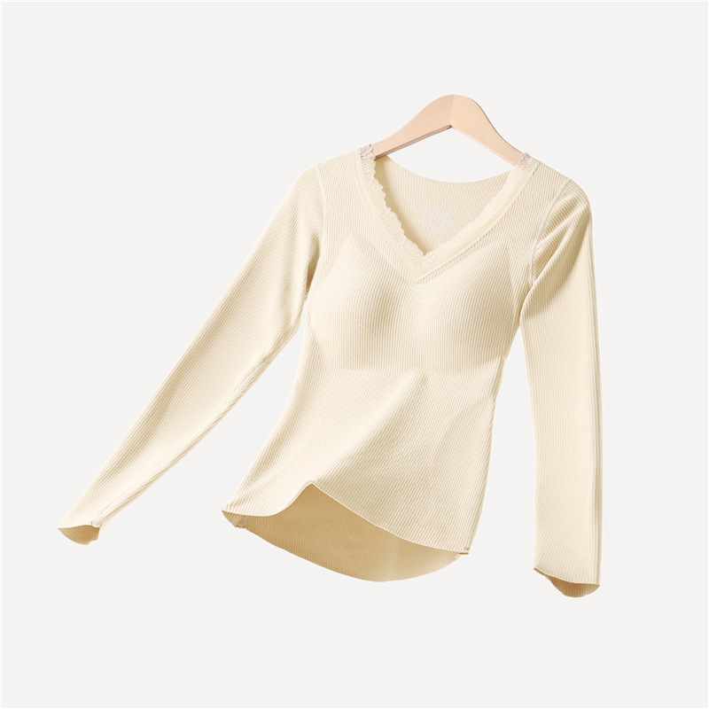 Moterų terminių apatinių komplektas su įdėta krūtinės pagalvėle, stora poliesterio medžiaga, V formos iškirptė, ilgomis rankovėmis viršutinė dalis ir kelnaitės (polieasterio audinys; įdėta krūtinės pagalvėlė; V- iškirptė; stora medžiaga)