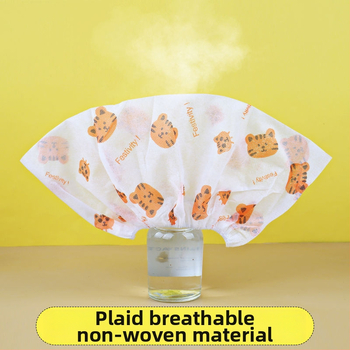 Vienkartiniai nepluošto avalynės uždangalai, su karikatūrų spauda, pakuotėje 50 vnt