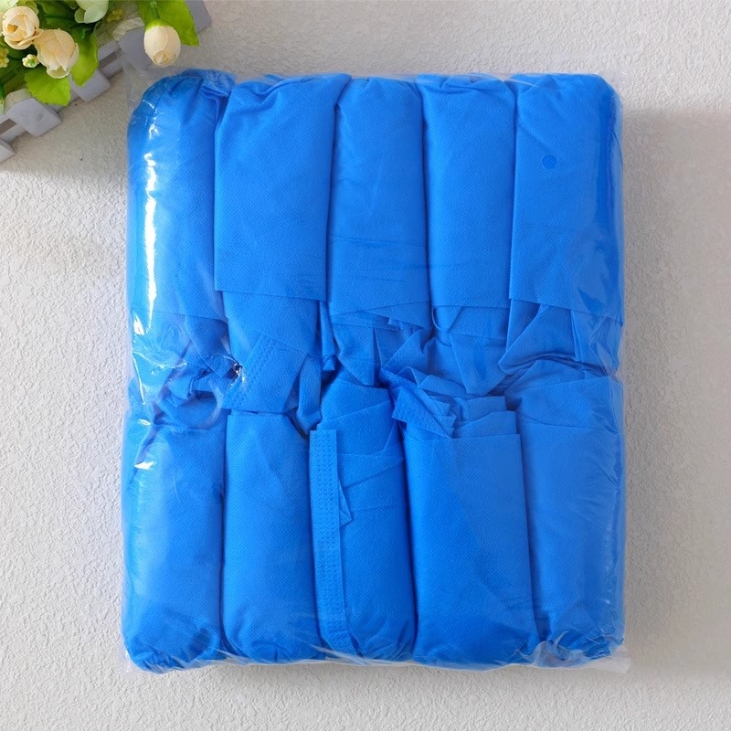 Vienkartiniai avalynės uždangalai vidaus naudojimui, stori, neslidūs, iš neaustų medžiagų, galima logotipo spauda, universalus naudojimas