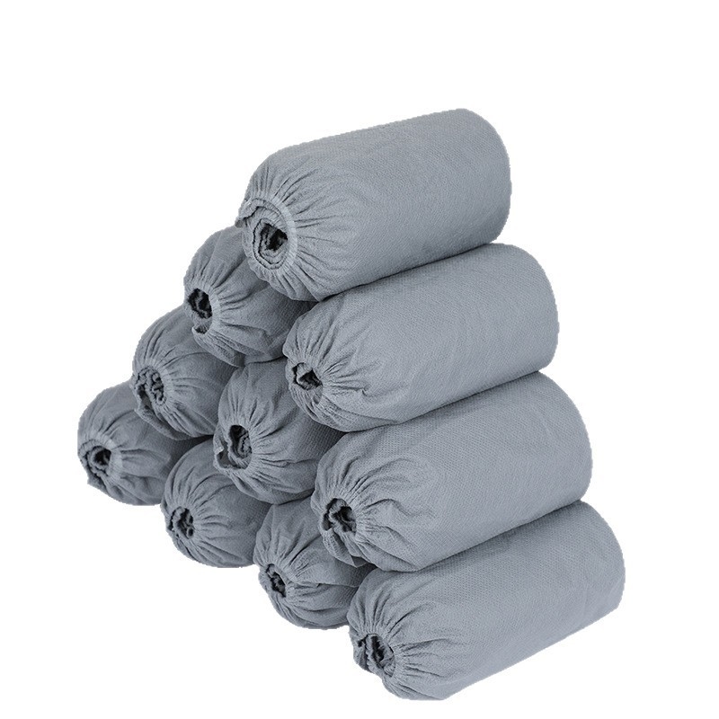 Vienkartiniai avalynės uždangalai vidaus naudojimui, stori, neslidūs, iš neaustų medžiagų, galima logotipo spauda, universalus naudojimas