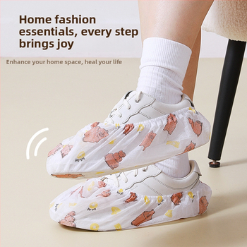 Vienkartiniai avalynės užklotai iš neaudinio medžiagos su kapibara raštu, elastinis žiedas ir tempimo raištis, namų naudojimui, įprastas storis