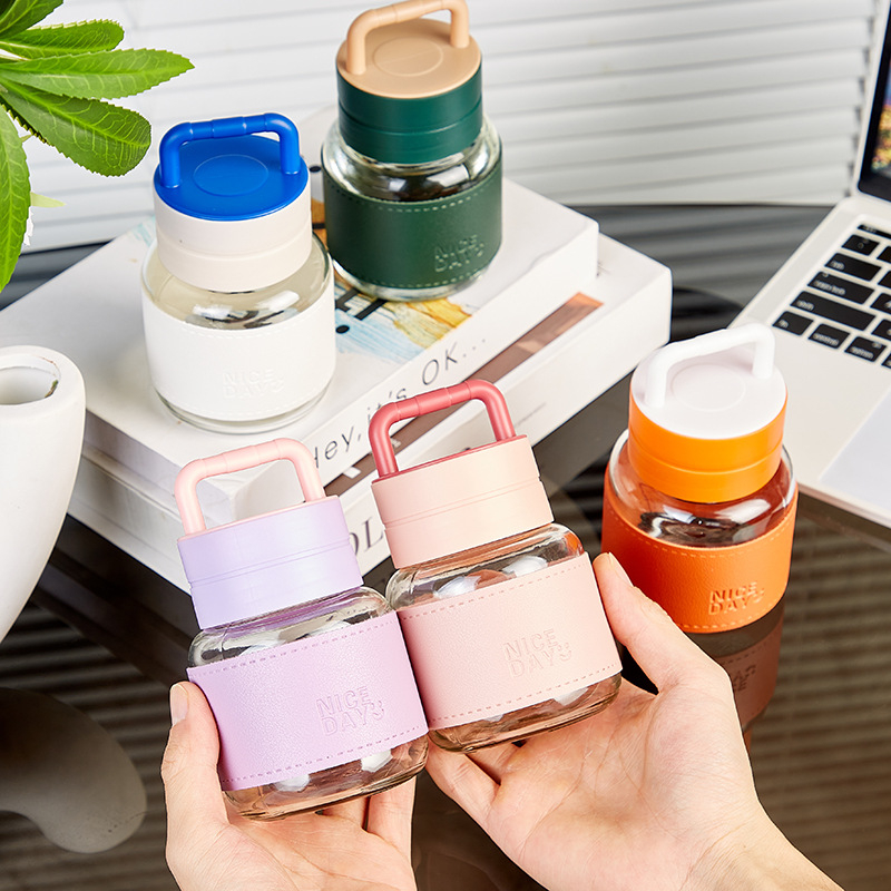 Prijenosna staklena čaša s poklopcem – nepropusna, otporna na visoke temperature, kompaktni kružni dizajn