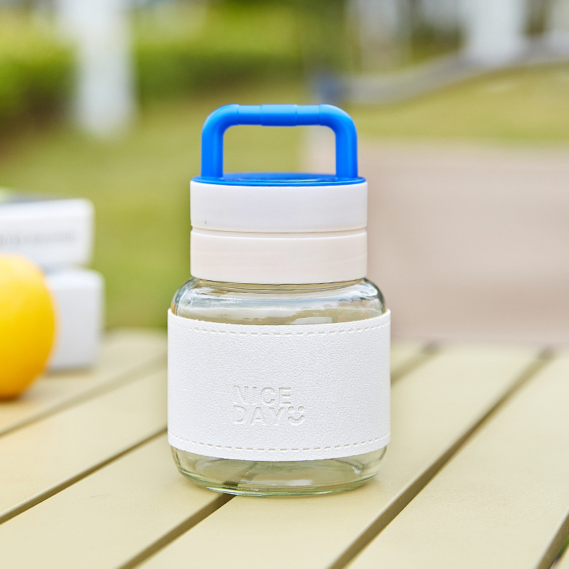 Prijenosna staklena čaša s poklopcem – nepropusna, otporna na visoke temperature, kompaktni kružni dizajn