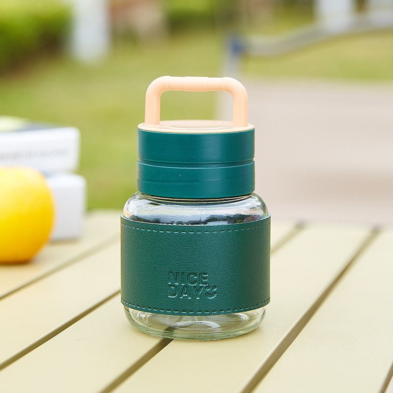 Prijenosna staklena čaša s poklopcem – nepropusna, otporna na visoke temperature, kompaktni kružni dizajn