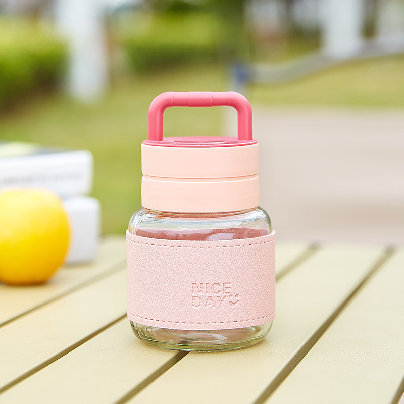 Prijenosna staklena čaša s poklopcem – nepropusna, otporna na visoke temperature, kompaktni kružni dizajn