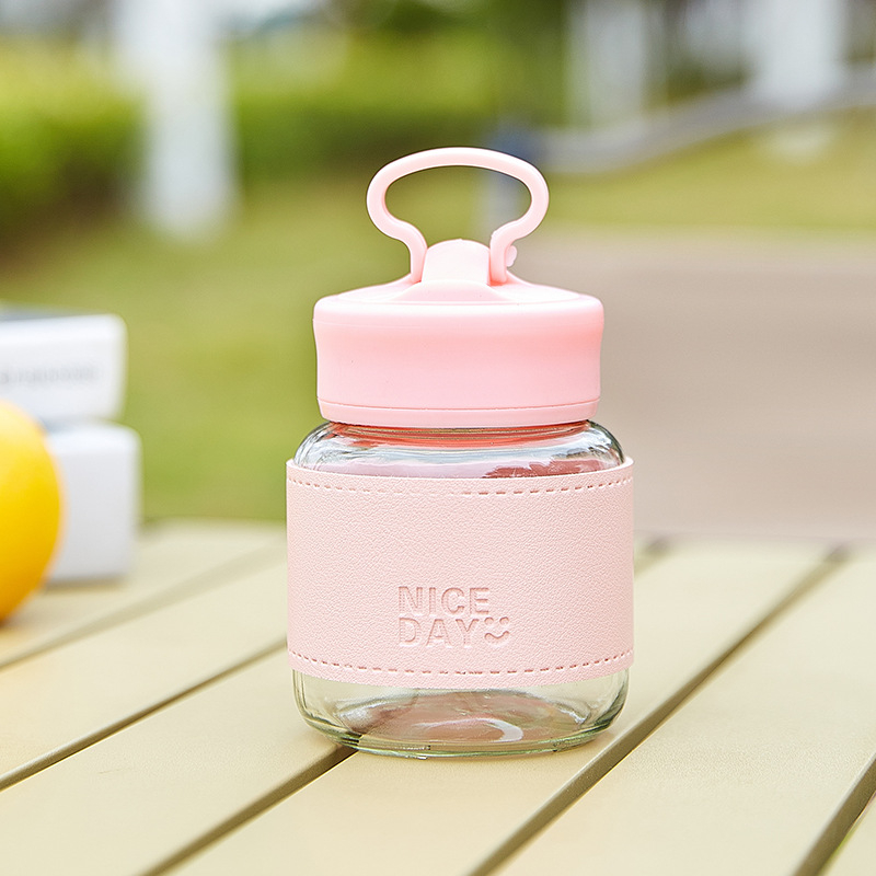 Prijenosna staklena čaša s poklopcem – nepropusna, otporna na visoke temperature, kompaktni kružni dizajn