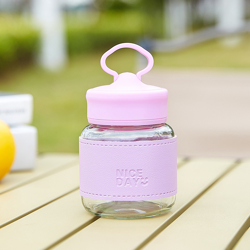 Prijenosna staklena čaša s poklopcem – nepropusna, otporna na visoke temperature, kompaktni kružni dizajn