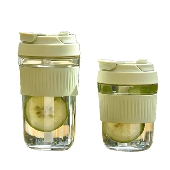 Staklena čaša otporna na visoke temperature, sa slamkom, ručno izrađena, s poklopcem; pogodno za ured, kavu i mlijeko.