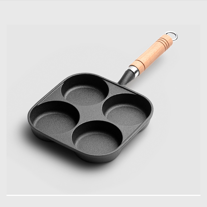 Ketaus kiaušinių keptuvė su 4 skylėmis, nelipnus paviršius, 2 cm gylis, 1 kg svoris, tinka visoms kaitlentėms