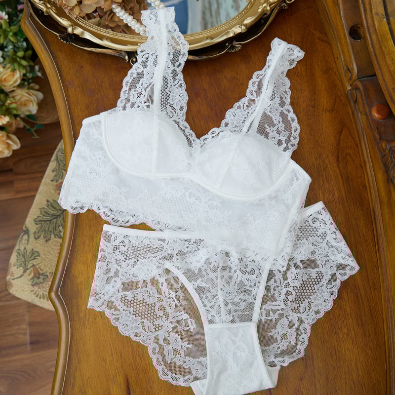 Belainė nėrinių liemenėlė su puse puodelio, plonas formuojamas puodelis, fiksuotos dvigubos petnešėlės, nugaros stilius vestai