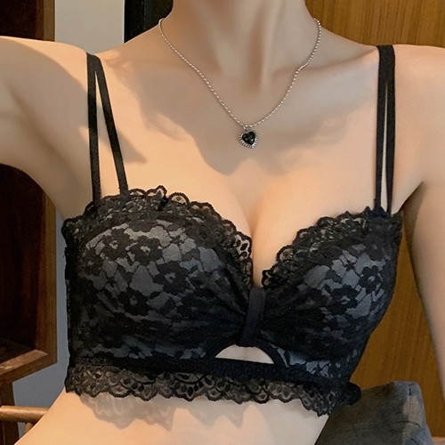 Be vielos liemenėlė iš nailono, su savilkimo funkcija, vidinis sluoksnis iš Spandex, nuimamos dvigubos pečiai, nugaroje užsegimas su keturiais užsegimo eilėmis, kaušelių forma: viršuje plonas, apačioje storas