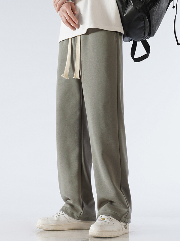 Férfi pamut sportnadrág fleece-béléses, laza szabású egyenes vonal, középmagas derekú övvel, mandzsettás zsinóros véggel, mindennapi sportnadrág, 65% pamut 35% poliészter