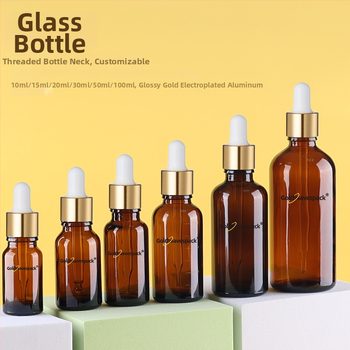 Pritaikytas stiklinis kosmetikos buteliukas su anti-vagystės lašintuvu, 18/410 kaklelis, spauda ir elektroplatinimas, skirta grožio pakuotei