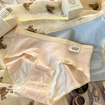 Mėnesinių apatinių drabužių moterims, vidutinio juosmens, pagrindinis audinys 95% medvilnė, tarpakičio įdaila 100% medvilnė; stilius: kelnaitės; funkcija: fiziologija.