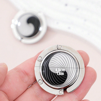 Portatyvinė sulankstoma maišų kabykla prie stalo krašto — cinko lydinys, vienas kabliukas, šiuolaikinis minimalistinis dizainas, prekės kodas Zh-036, 1 vnt