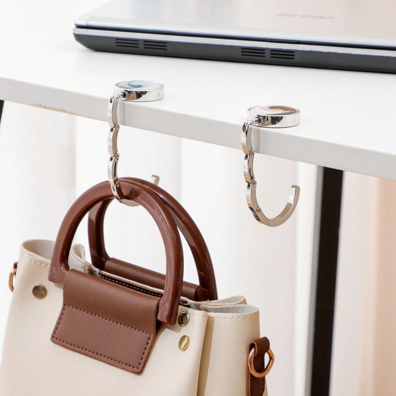 Portatyvinė sulankstoma maišų kabykla prie stalo krašto — cinko lydinys, vienas kabliukas, šiuolaikinis minimalistinis dizainas, prekės kodas Zh-036, 1 vnt