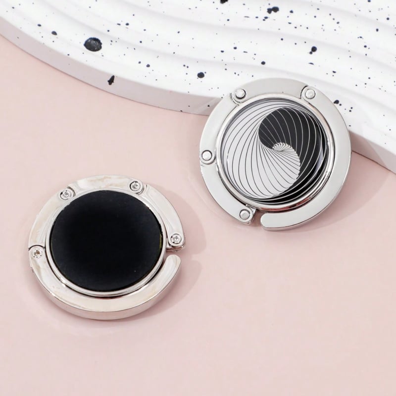 Portatyvinė sulankstoma maišų kabykla prie stalo krašto — cinko lydinys, vienas kabliukas, šiuolaikinis minimalistinis dizainas, prekės kodas Zh-036, 1 vnt