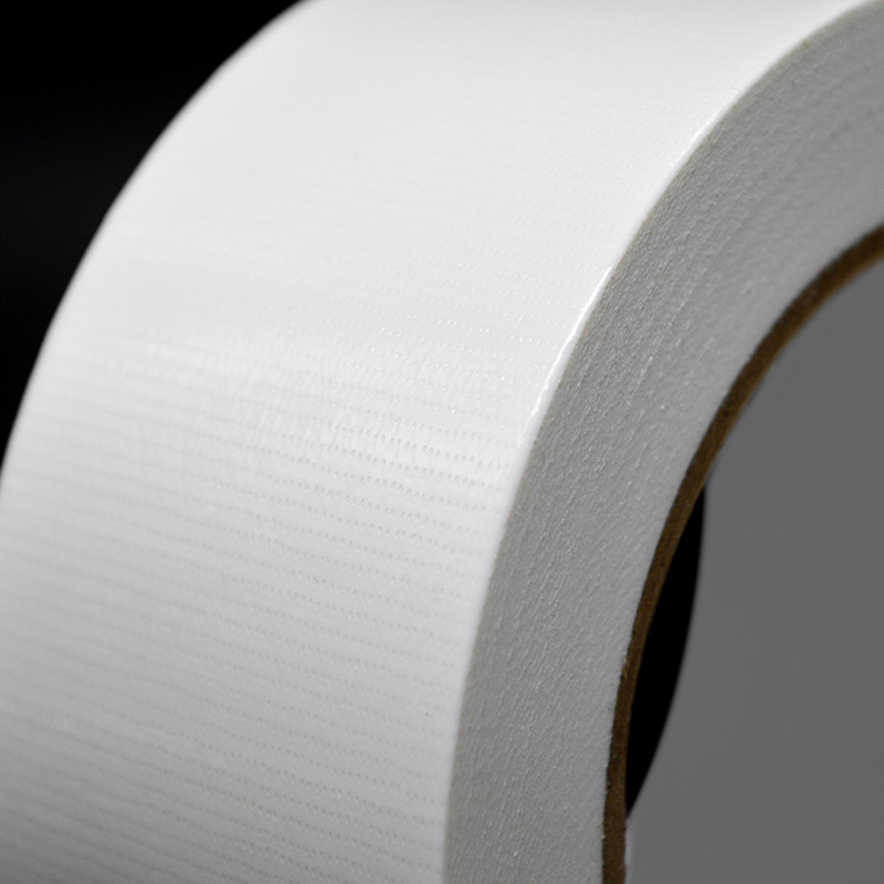 Audinių kilimų siūlių juosta — atspari abrazijai, atspari vandeniui, lengvai plyštanti, aukšta adhezija, skirta kilimų siūlėms