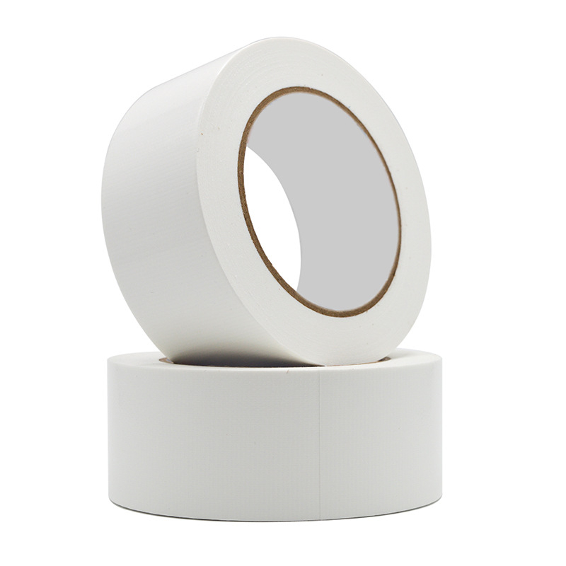 Audinių kilimų siūlių juosta — atspari abrazijai, atspari vandeniui, lengvai plyštanti, aukšta adhezija, skirta kilimų siūlėms