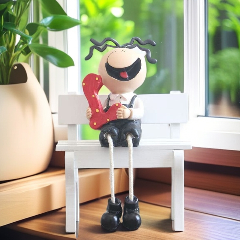 Gyanta karikatúra lógó baba gravírozott kivitelben, ideális üzleti ajándéknak