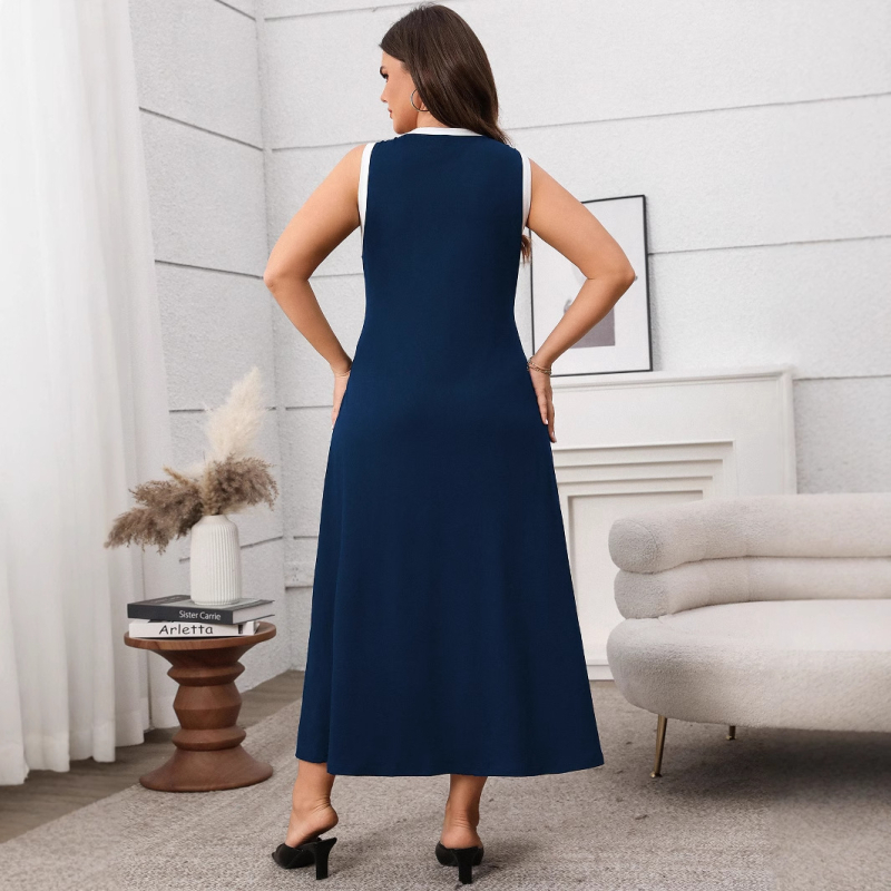 Hosszú ruha absztrakt mintával, poliészter anyag, ujjatlan, kerek nyakú, derekát kiemelő dizájn