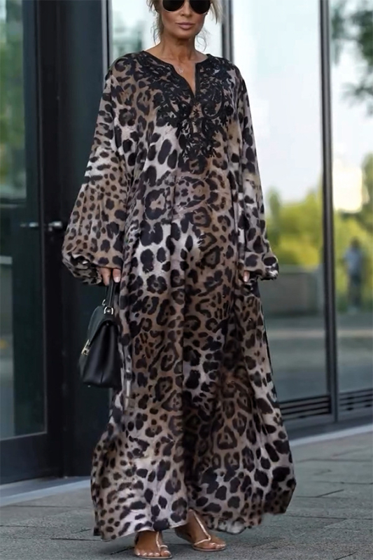 Haljina s leopardim uzorkom, V-dekolte, rukavi fenjera, A-linijski kroj, poliester