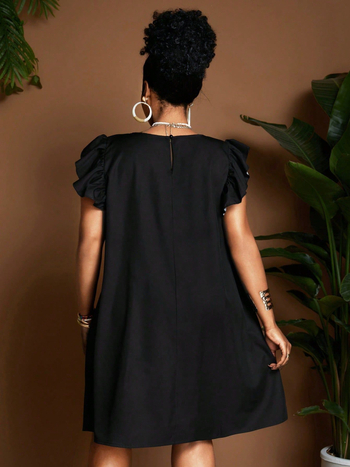 Spausdinta poliesterinė suknelė su A linija, midi ilgio, apvalaus kaklo ir trumpomis rankovėmis