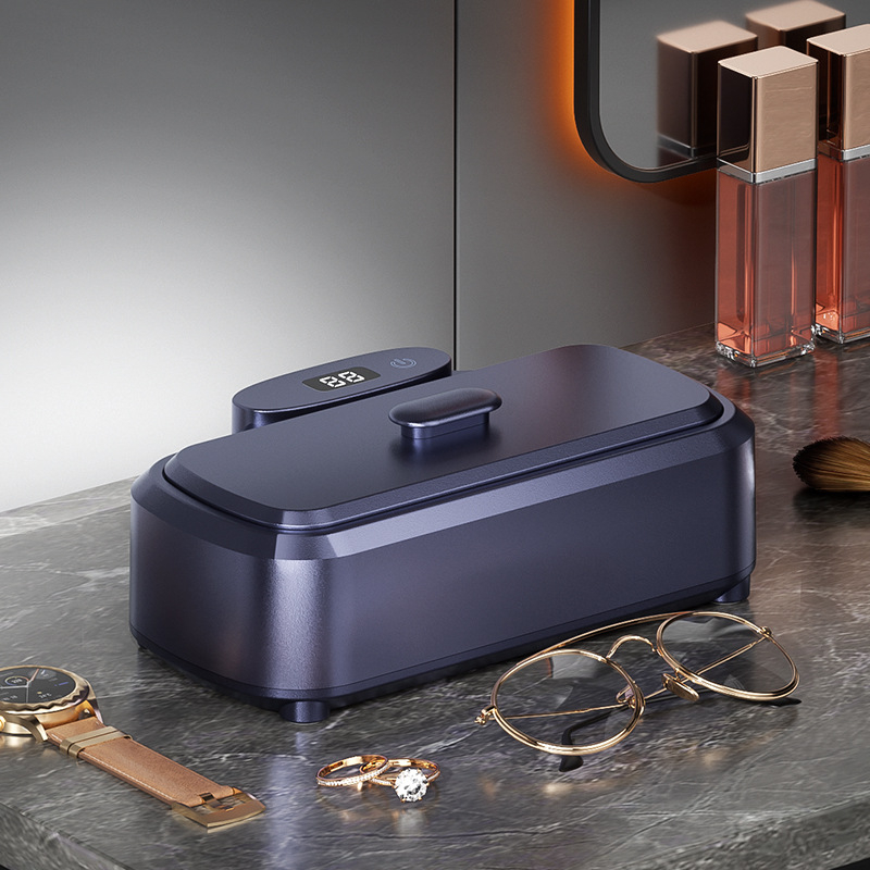 Ultragarsinis valymo įrenginys akinėms, juvelyrikai, breketėms ir kontaktiniams lęšiams, sterilizavimas, didelė talpa; Modelis 975; Darbinis režimas: mechaninis; Laiko funkcija: <2 val.; Maitinimas: kintamoji srovė, 100–240 V