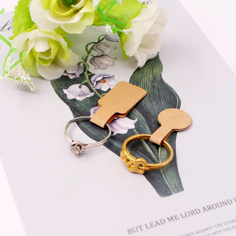 Pašlīmėta kainų etiketė žiedams ir juvelyrikai, stačiakampio formos, matinė danga