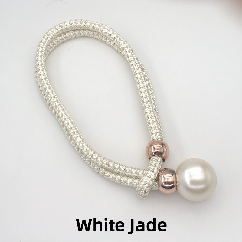 Audinių užuolaidų raišteliai su perlų akcentais, reguliuojami surišimo dirželiai, lengvas prabangos stilius