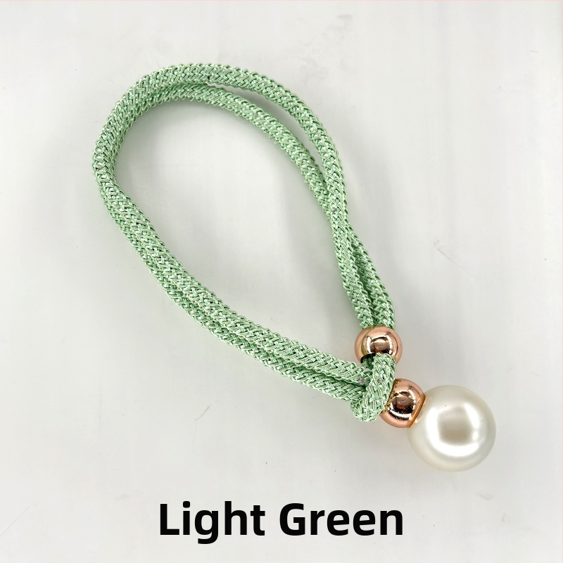 Audinių užuolaidų raišteliai su perlų akcentais, reguliuojami surišimo dirželiai, lengvas prabangos stilius