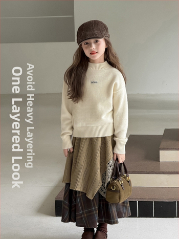 Vaikų netaisyklingo langelių sijonas iš švelnaus poliesterio audinio (69,8% poliesteris), 3–8 metų amžiui (100–140 cm), 2025 m. ruduo