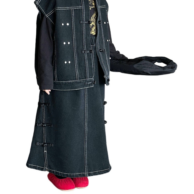 Mergaitėms skirtas naujojo kinų stiliaus džinsinis sijonas, ilga A linija (Medžiaga: medvilnė; Stilius: džinsinis; Siluetas: A linija; Amžiaus grupė: 3–8 metai)