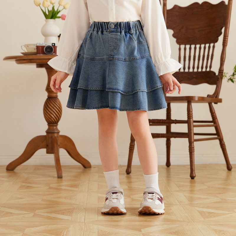 Mergaitei džinsinis sijonas, Korėjos stiliaus, fishtail siluetas, medvilninis audinys, pamušalas poliesteris