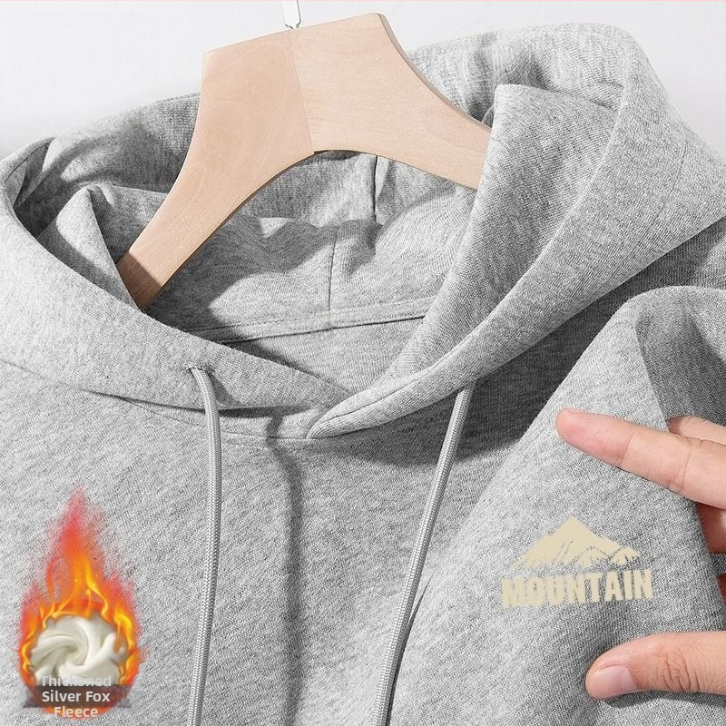 Hrubá bavlnená mikina s kapucňou, okrúhly výstrih, voľný strih, patch vrecká