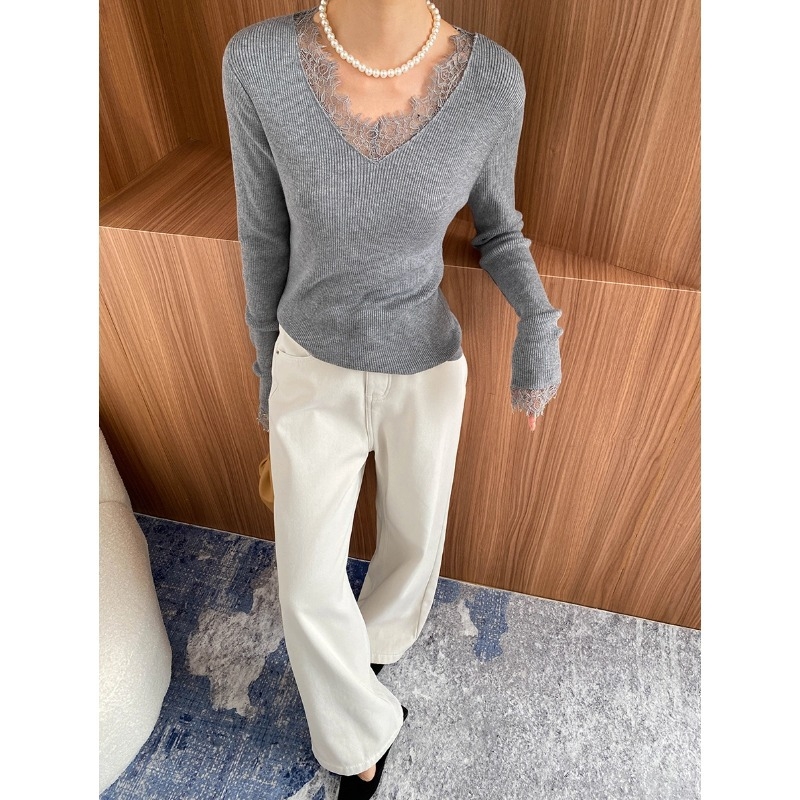 V-kaelusega kampsun, sale lõige, paks kudum, polüester-nailon segu, pikkade varrukatega.