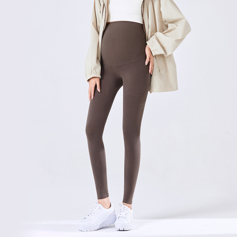 Rasedate jaoks tihedad püksid kõrge vööga ja kõhu toega – peamine kangas puuvill 80–90%, nailon, kitsas lõige, kõrge elastikkus, kevad-sügis 2025