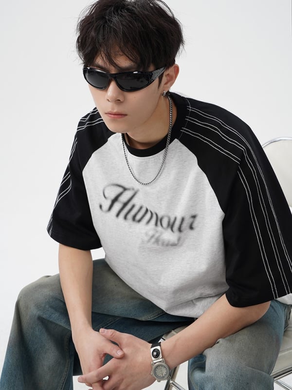 Raglan rankovių marškinėliai, apvalus kaklas, 100% medvilnė, laisvas kirpimas, grafinis atspaudas