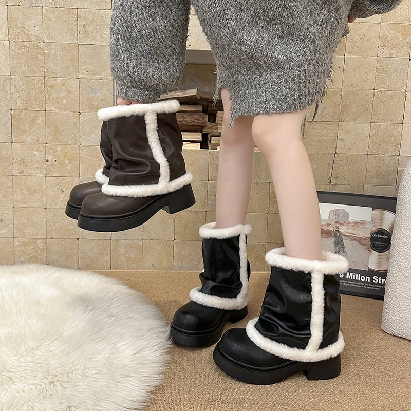 Sieviešu ziemas zābaki ar mākslīgu kažoku un biezu gumijas zolu – iekšējā odere no mākslīgā kažoka, vidēja augstuma potītes, apaļš purns