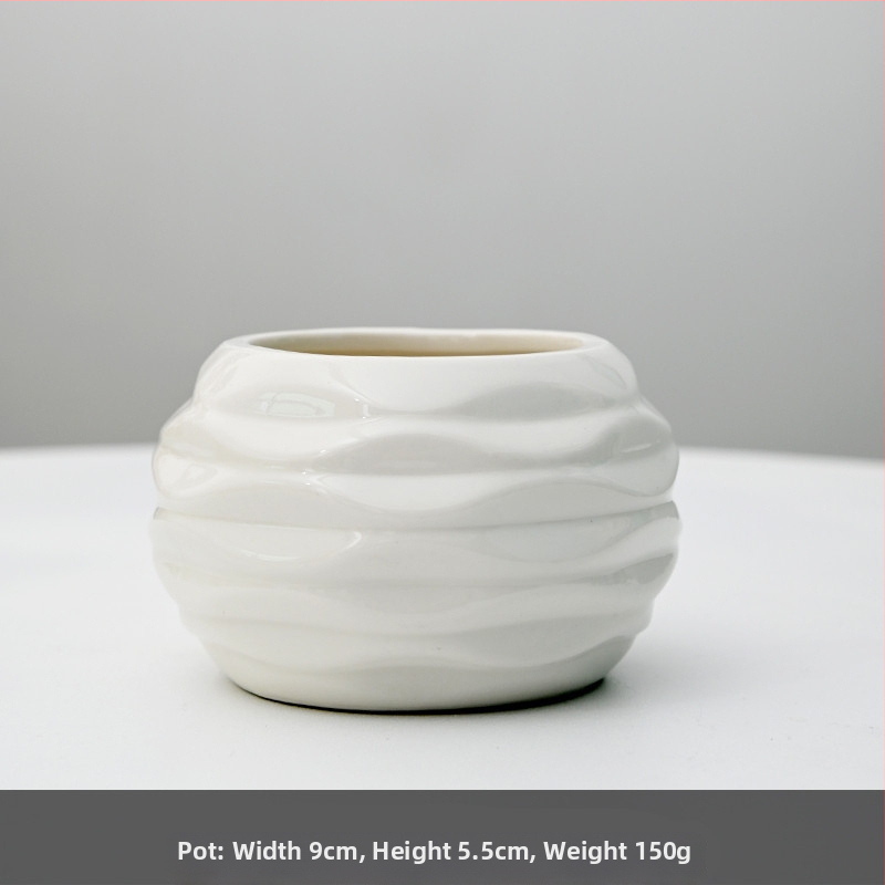 Keraamiline lillepott logotüübi trükiga; lihtne portselani disain; sobib laua- või põrandakasutuseks; poolmanuaalne tootmisprotsess.