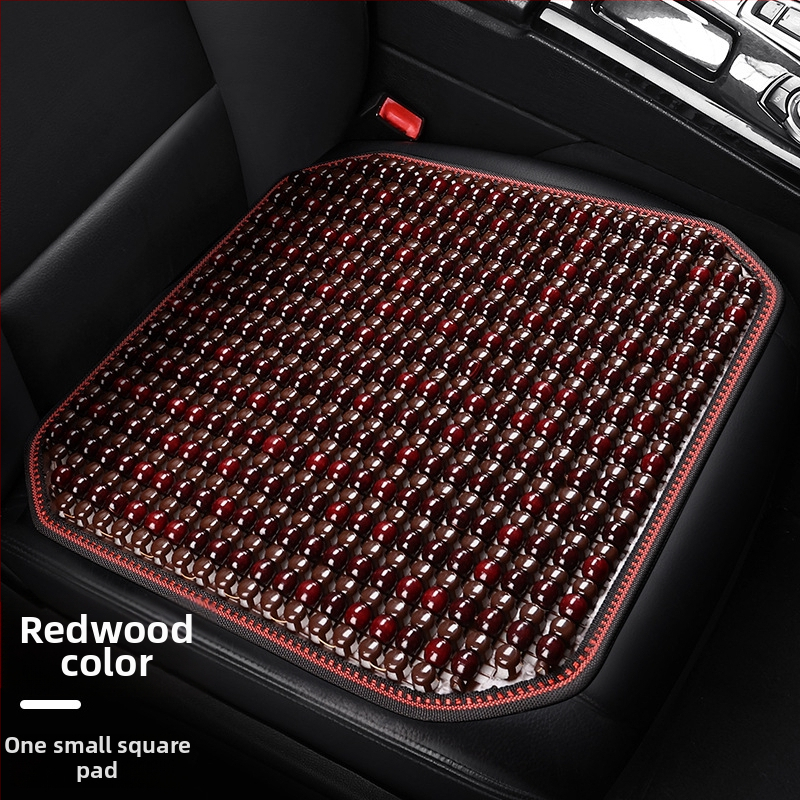 Automobiļa sēdekļa spilvens, viengabala kvadrātiska no koka lodītēm, aizmugures sēdeklim, elpojošs un pretslīdējošs.