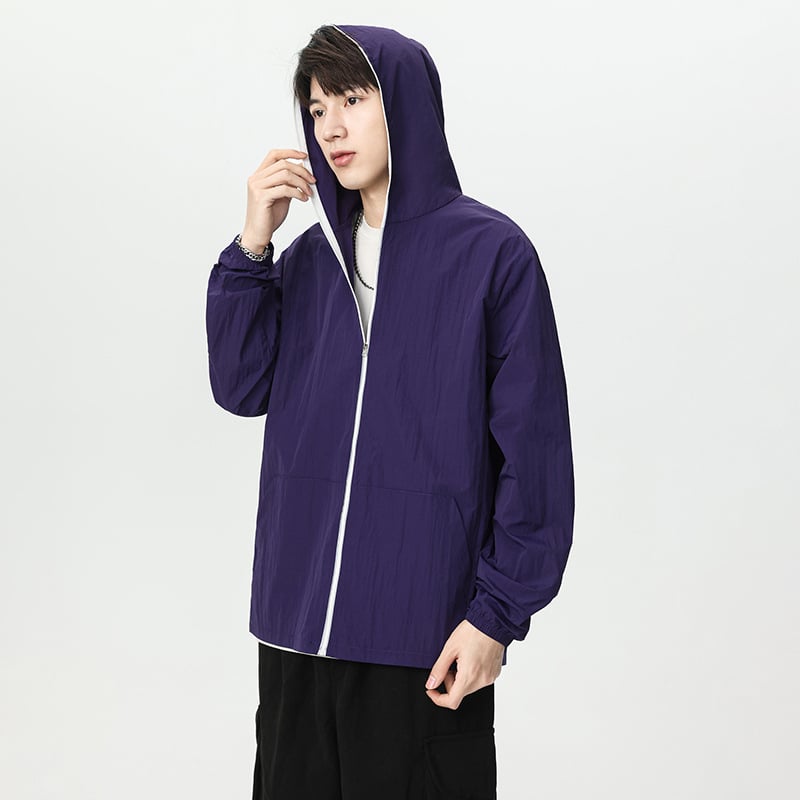 Kapuutsiga kerge nailonist jope UPF50+ päikesekaitsega, tõmblukuga, külgjoone taskutega, vaba lõige, suveks