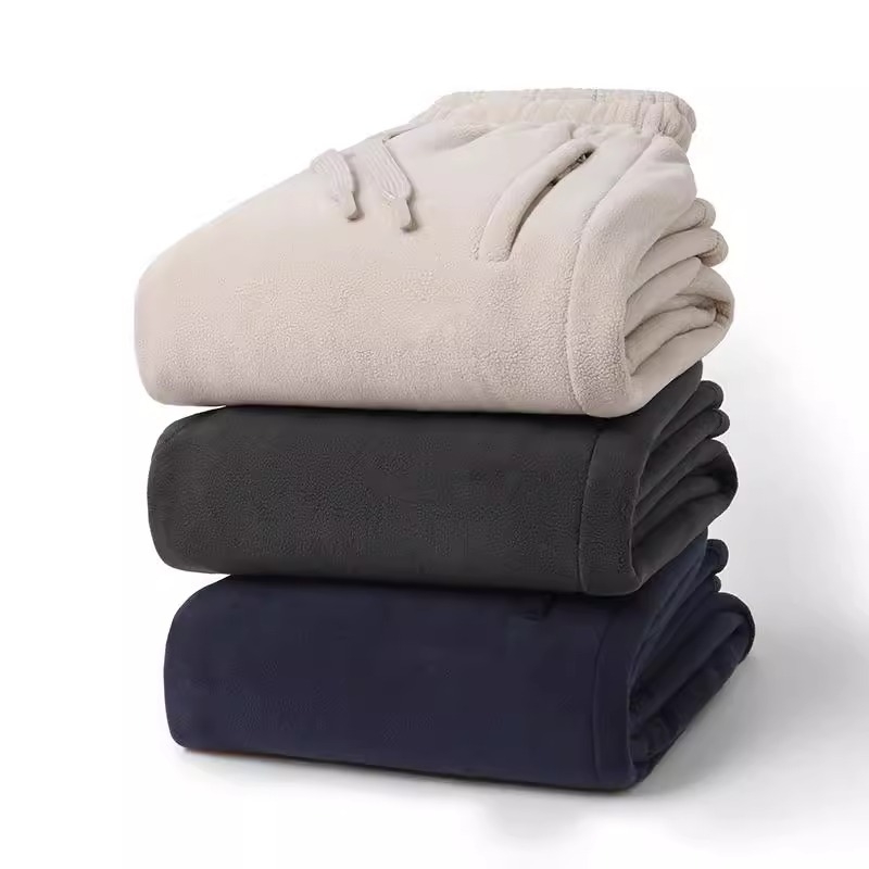 Meeste talvised spordijalatsid, paksenenud fliisiga, sirge lõige, keskmine vöökoht, nööriga kinnitamine