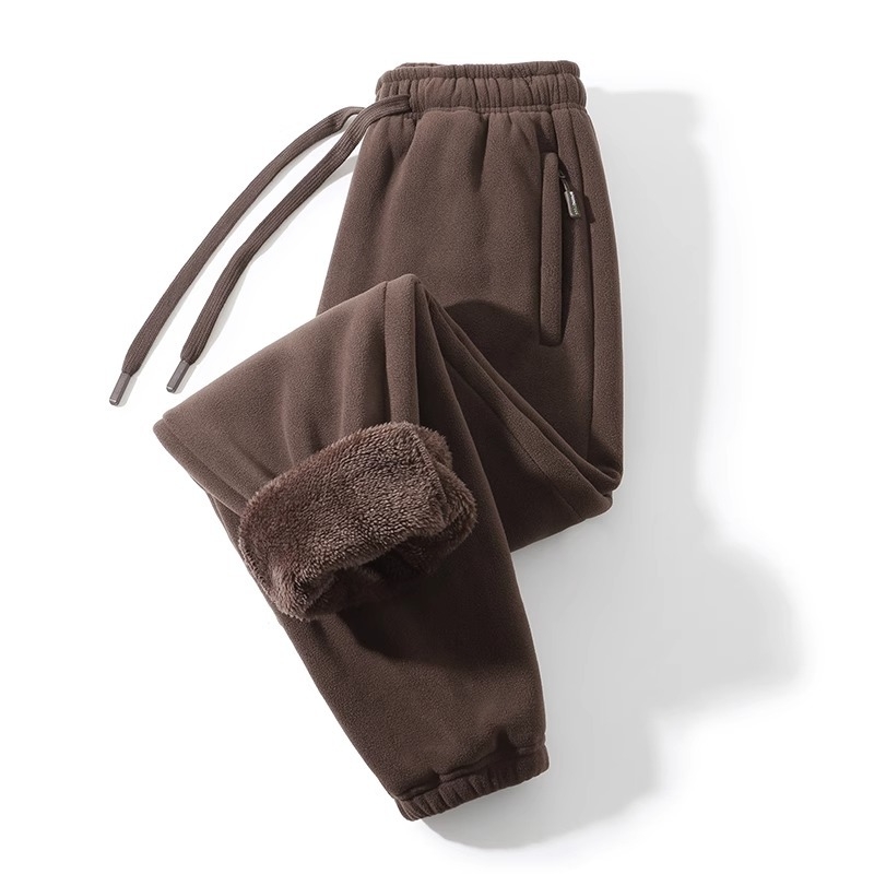 Meeste talvised spordijalatsid, paksenenud fliisiga, sirge lõige, keskmine vöökoht, nööriga kinnitamine