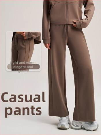 Kelnės su aukštu juosmeniu, tiesus laisvas kirpimas, rayon oro sluoksnio audinys; poliesteris 81%, viskozė 15%, spandansas 4% (Hyosung)