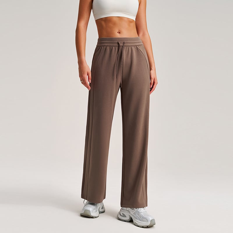 Kelnės su aukštu juosmeniu, tiesus laisvas kirpimas, rayon oro sluoksnio audinys; poliesteris 81%, viskozė 15%, spandansas 4% (Hyosung)